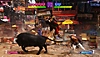 Street Fighter 6-screenshot van Ken die wordt gevloerd door een stier