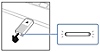 Ylhäältä otettu kuva PS Link -USB-sovittimesta, joka on liitetty tietokoneeseen, ja tilan merkkivalon selite. Merkkivalo vilkkuu.