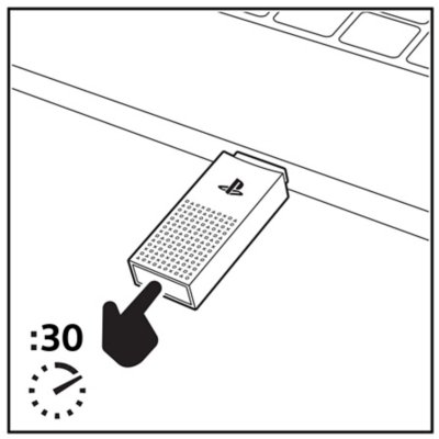 Bovenaanzicht van de PS Link USB-adapter die is aangesloten op een computer, met pictogram van een hand met stopwatch met de aanwijzing dat je de toets 30 seconden ingedrukt moet houden.
