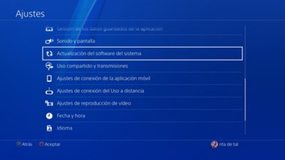 Pantalla de ajustes de PS4 con la opción Actualización del software del sistema resaltada.