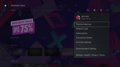 View of PlayStation Store menu on PS5, with the three dot menu icon highlighted in the upper right, and the wallet balance circled.