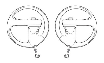 Attaching charging adaptors to PSVR2 Sense controllers.