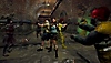 Captura de pantalla de SURV1V3 en la que se ve a un grupo de supervivientes parados en una unidad para disparar zombis.