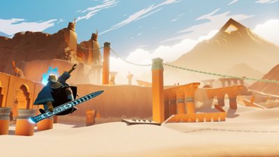 Gameplay screenshot from Sword of the Sea depicting a character surfacing across a desert ruin.