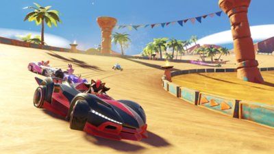 Captura de pantalla de Team Sonic Racing que muestra la carrera de coches en un circuito arenoso