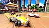 Team Sonic Racing-skærmbillede, der viser Tails i en gul bil