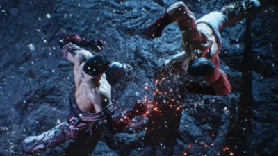 《铁拳8》截屏，展示两名角色在火山场景战斗的俯视画面