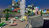 Screenshot van Tentacular waarin een brandend busje in het midden van een dorp staat