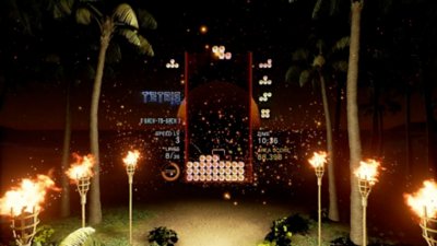 Screenshot van Tetris Effect Connected waarin de game wordt gespeeld met een achtergrond van een donker, tropisch eiland