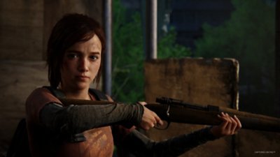 The Last of Us Part I screenshot showing Ellie holding a rifle