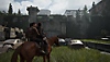 The Last of Us Part II – Screenshot, der Ellie und Dina auf dem Rücken eines Pferds in Seattle zeigt