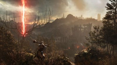 لقطة شاشة للعبة Lords of the Fallen تعرض أحد الشخصيات يحمل سلاحًا ينظر إلى دمار وشعاع أحمر موجود على مسافة بعيدة