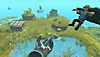 Snímek obrazovky ze hry Townsmen VR s obříma rukama držícíma vesničana.