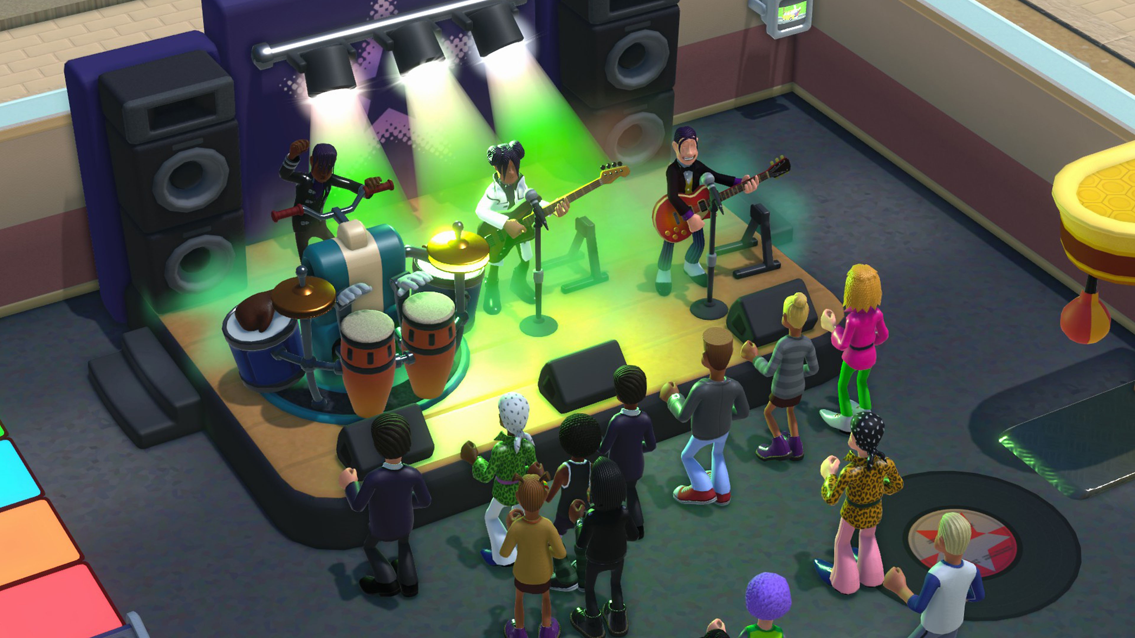 Screenshot von Two Point Campus, auf dem eine Band zu sehen ist, die auf einer Bühne spielt.