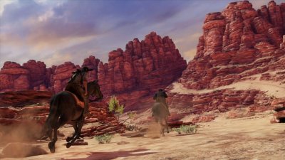 لقطة شاشة من مجموعة uncharted "ناثان دريك" تعرض شخصيتين تمتطيان حصانًا في وادي الصخور الحمراء