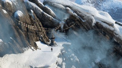 لقطة شاشة من مجموعة uncharted "ناثان دريك" تعرض "ناثان" يقف في الثلج في الهيمالايا