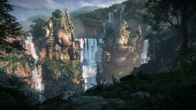 لقطة شاشة من Uncharted: The Lost Legacy تعرض شلالًا بين تمثالين.