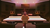 لقطة شاشة للعبة We Are OFK تظهر فيها شخصية تجلس على مكتب في استوديو لإنتاج الموسيقى