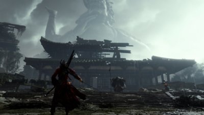 Captura de pantalla de Where Winds Meet que muestra al jugador acercándose a un templo en ruinas que está custodiado por un enemigo