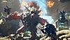 Captura de pantalla de Wild Hearts que muestra a un personaje luchando contra una bestia gigante