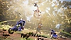 Snímek obrazovky ze hry Wo Long Fallen Dynasty zobrazující božského tvora Qinglonga, který léčí skupinu hráčů