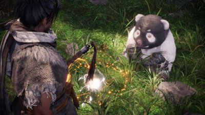 Captura de pantalla de Wo Long: Fallen Dynasty que muestra al jugador topándose con un tierno Shitieshou con aspecto de panda