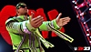 Screenshot von WWE 2K23, auf dem ein Wrestler seine Arme ausstreckt.