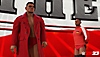WWE 2K23 screenshot of wrestler standing looking out toward the ring.