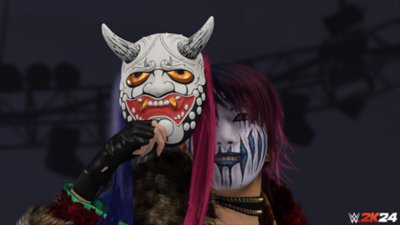 WWE 2K24 screenshot met worstelaar Asuka met een masker