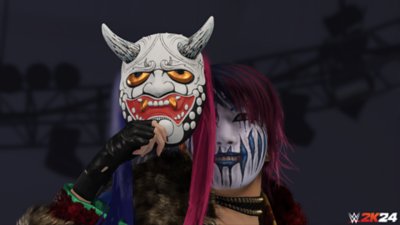 لقطة شاشة من لعبة WWE 2k24 تعرض المصارعة Asuka وهي ترتدي قناع