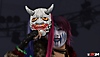 Captura de pantalla de WWE 2k24 de la luchadora Asuka con una mascara