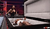 Captura de pantalla de WWE 2K24 de un combate de ataúdes en curso