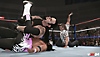 Capture d'écran de WWE 2K24 – un match du mode Arbitre invité, auquel participe l'Undertaker