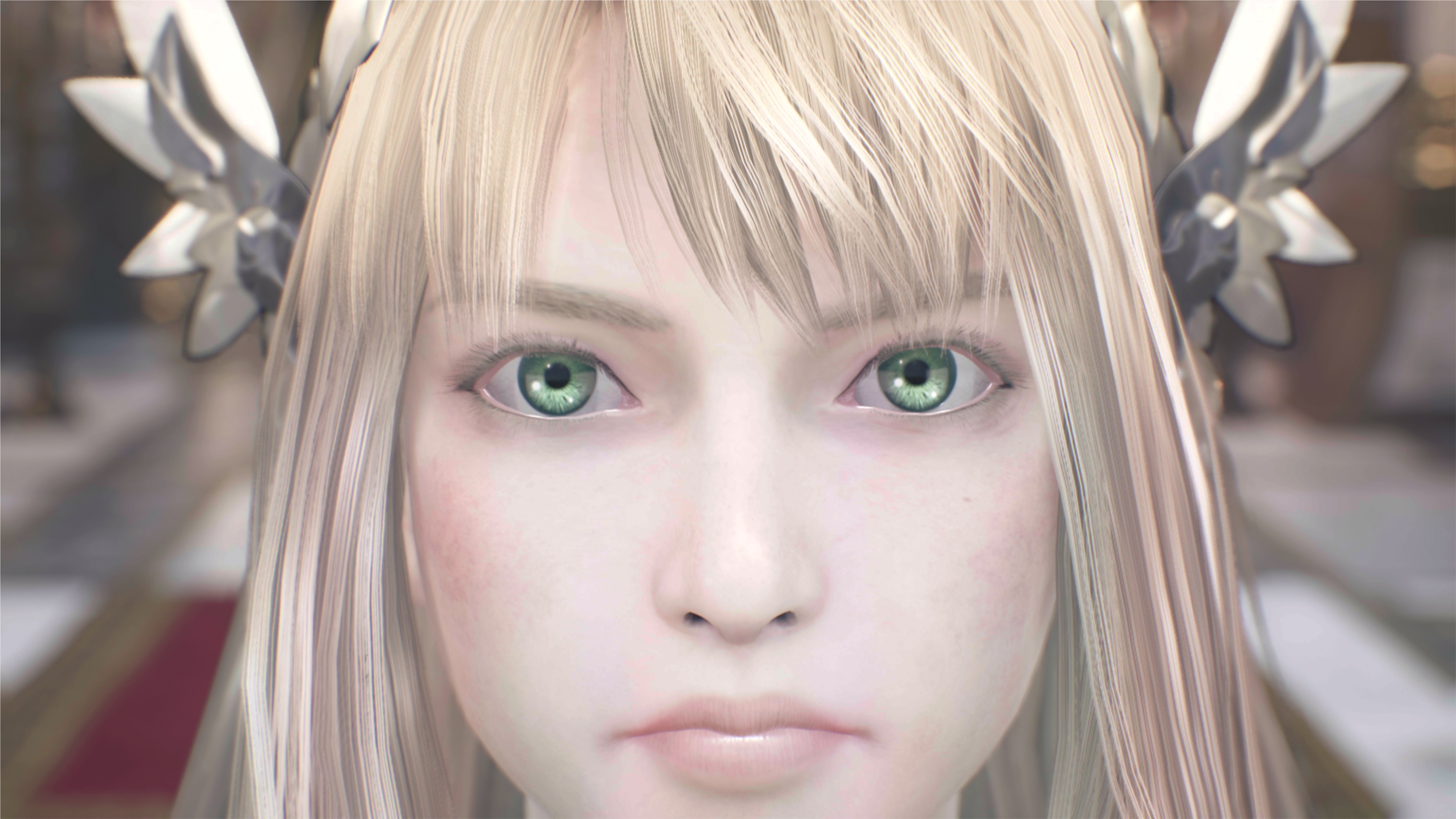 Valkyrie Elysium screenshot showing close up image of character with blonde hair and green eyes