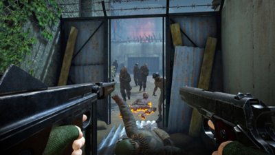 Snimak ekrana igre Zombie Army VR na kom je prikazan lik naoružan dvama oružjima